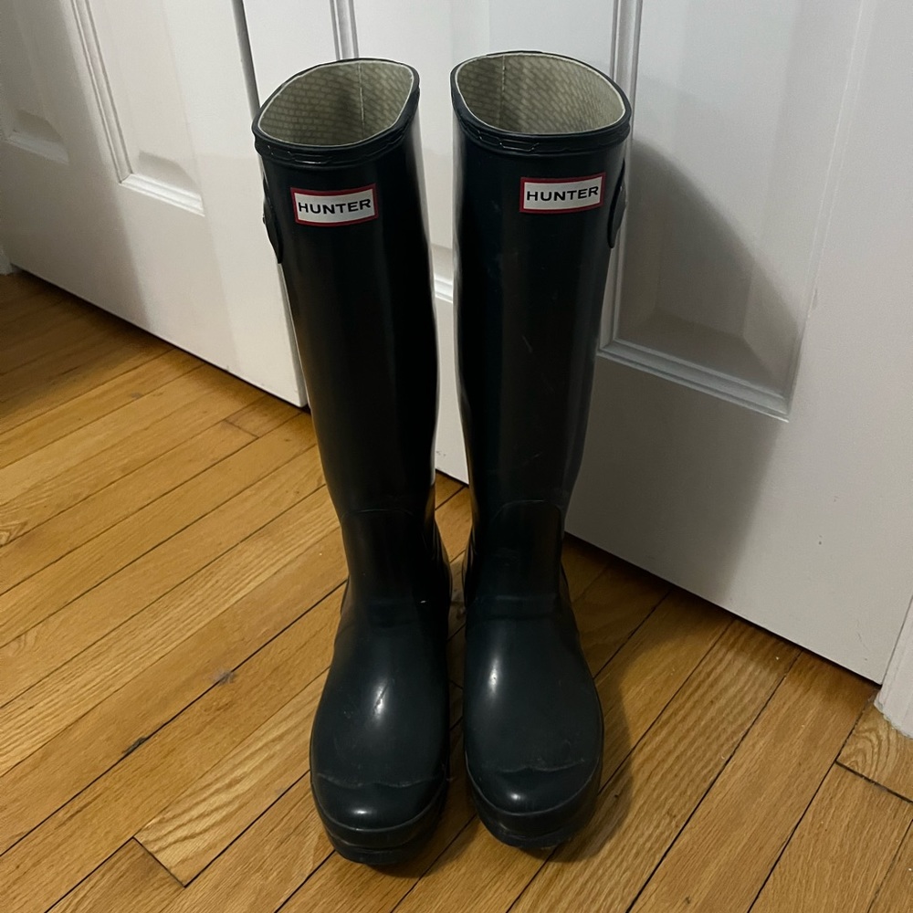 Glossy navy knee high hunter rain boots
